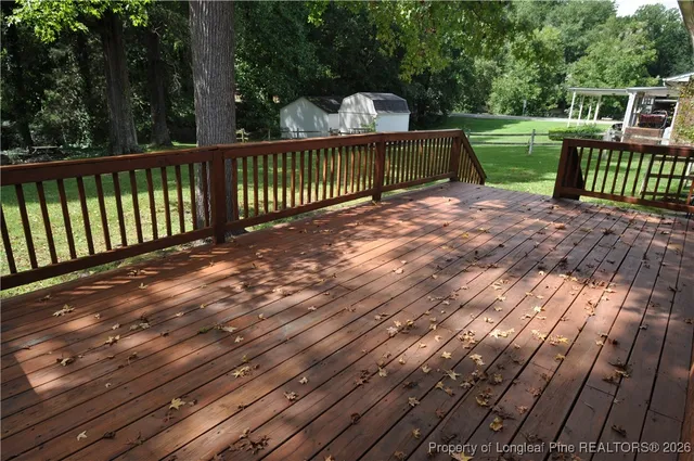a view of a wooden fence