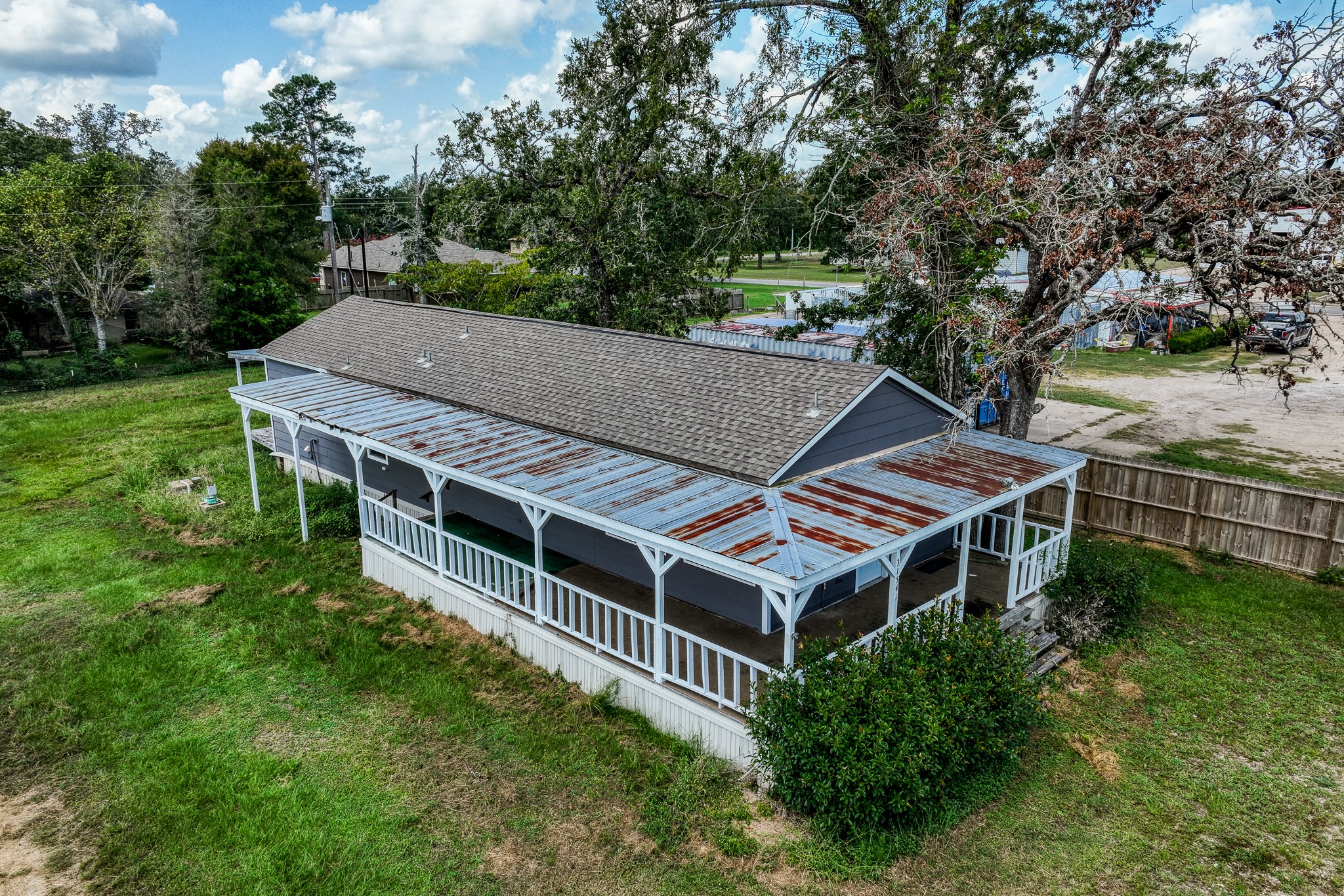 31523 Farm To Market Road 1736 Hempstead, TX 77445 - Photo 11 of 13 an aerial view of a house with yard and roof deck