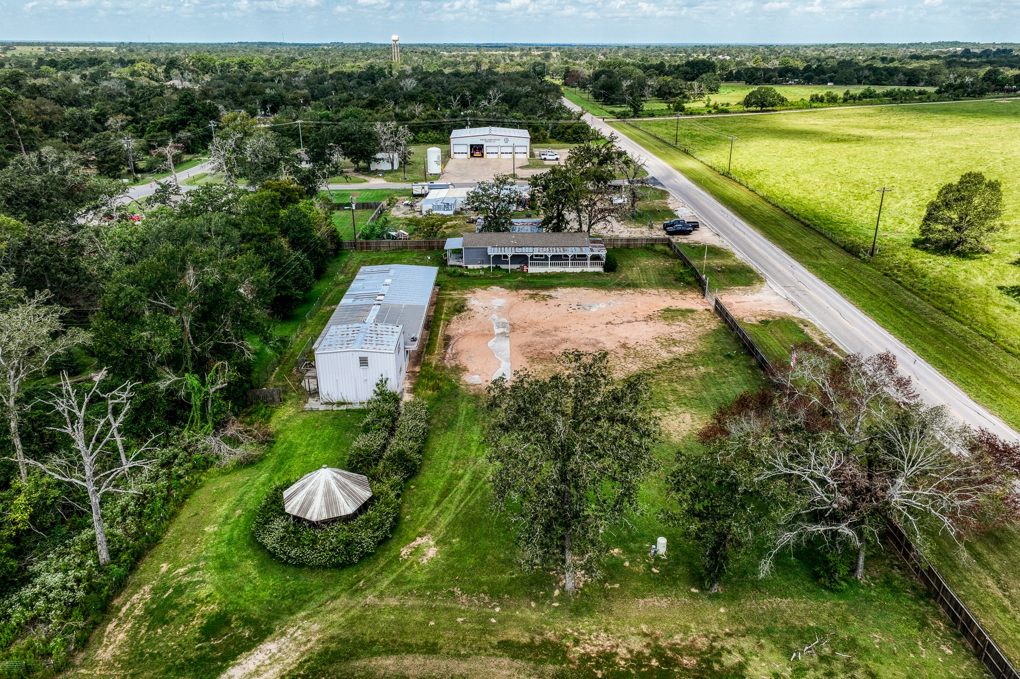 31523 Farm To Market Road 1736 Hempstead, TX 77445 - Photo 13 of 13 an aerial view of a house with a yard and lake view