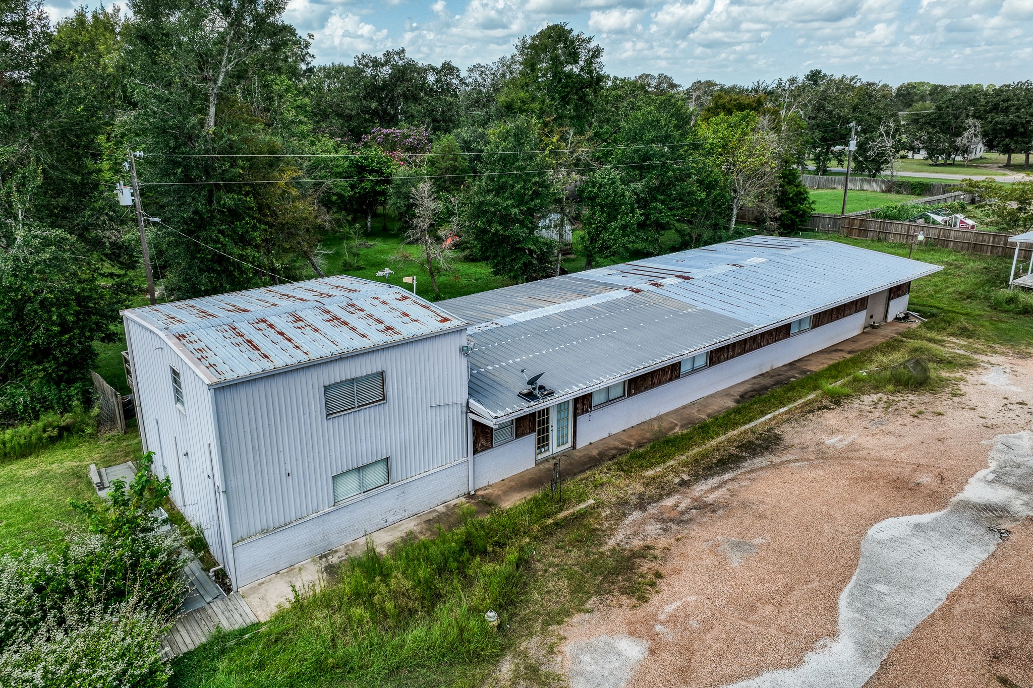 31523 Farm To Market Road 1736 Hempstead, TX 77445 - Photo 2 of 13 an aerial view of a house with a yard