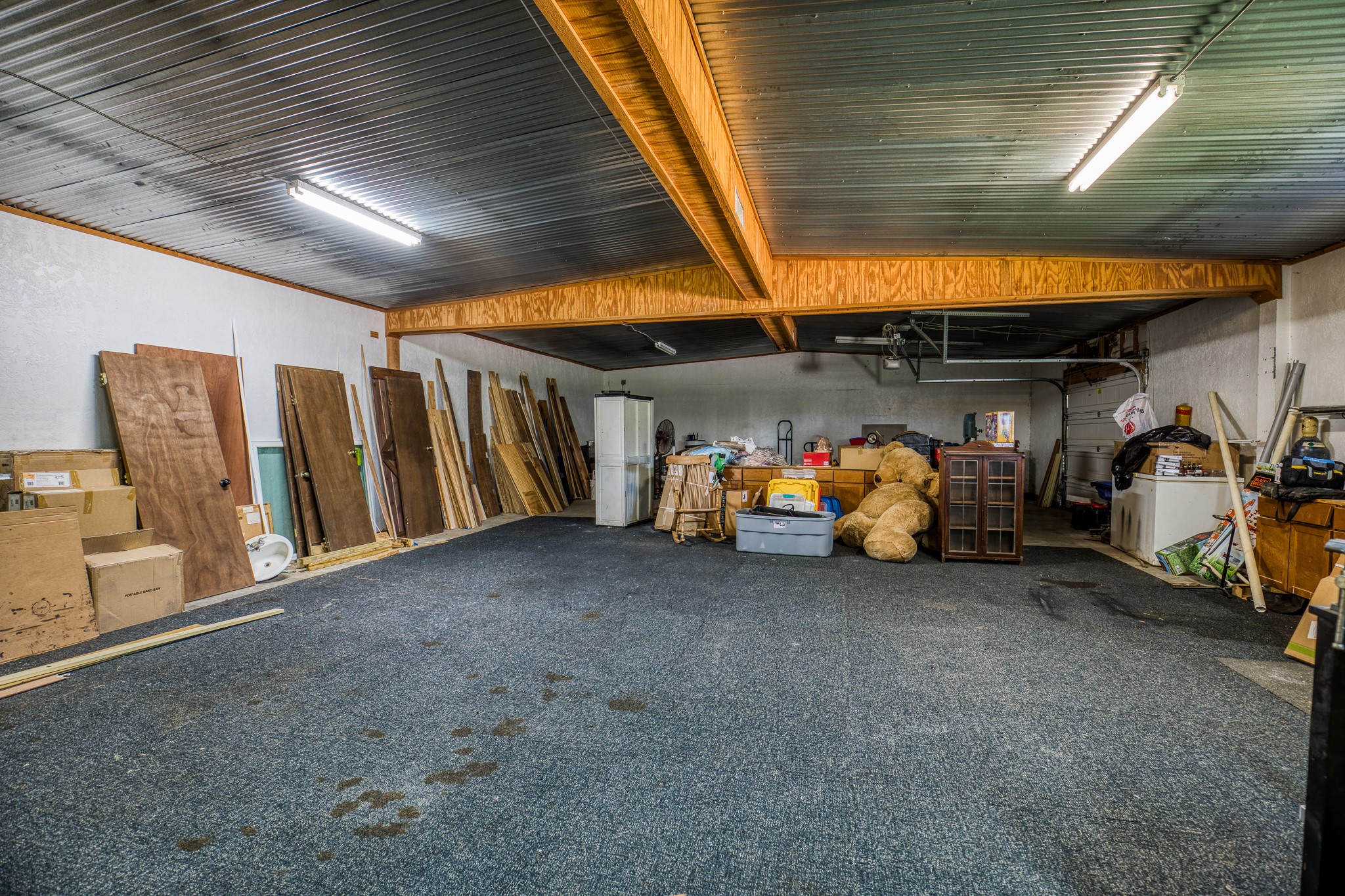 31523 Farm To Market Road 1736 Hempstead, TX 77445 - Photo 5 of 13 a view of a garage with parked cars