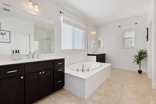 a view of a swimming pool with a lounge chairs