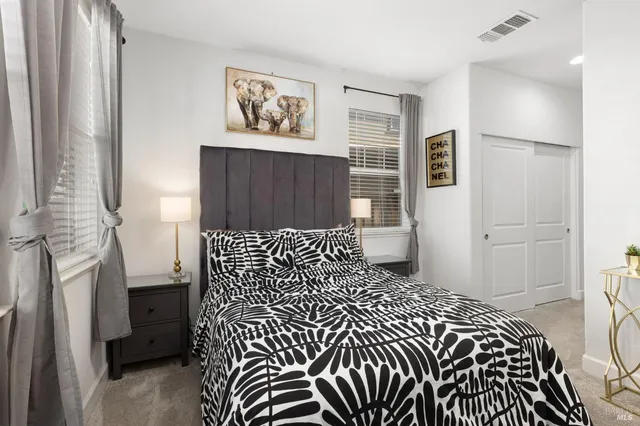 a view of a hallway with closet