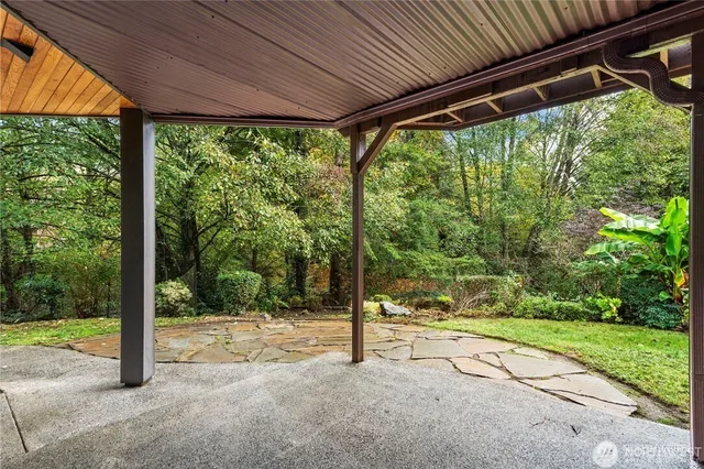 a view of a room with porch and a yard