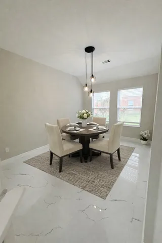 a view of a house with a garage