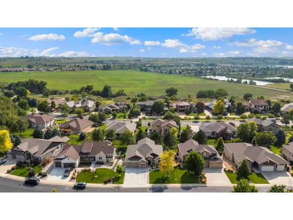 a view of lake and houses with outdoor space