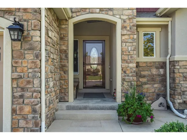 a front view of a house with a porch