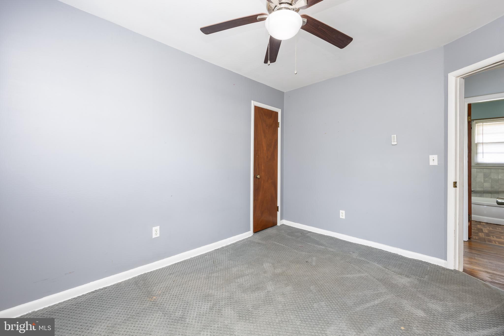310 Zion Road Salisbury, MD 21804 - Photo 25 of 40 an empty room and chandelier fan