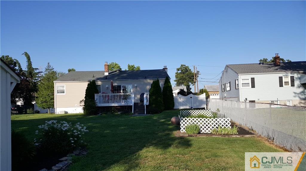 16 Ferris Road Edison, NJ 08817 - Photo 22 of 25 a front view of a house with a yard