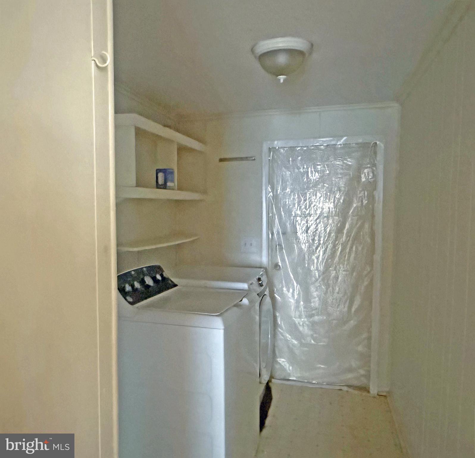 36298 Marsh Road, Unit 204 Rehoboth Beach, DE 19971 - Photo 14 of 26 Laundry Room