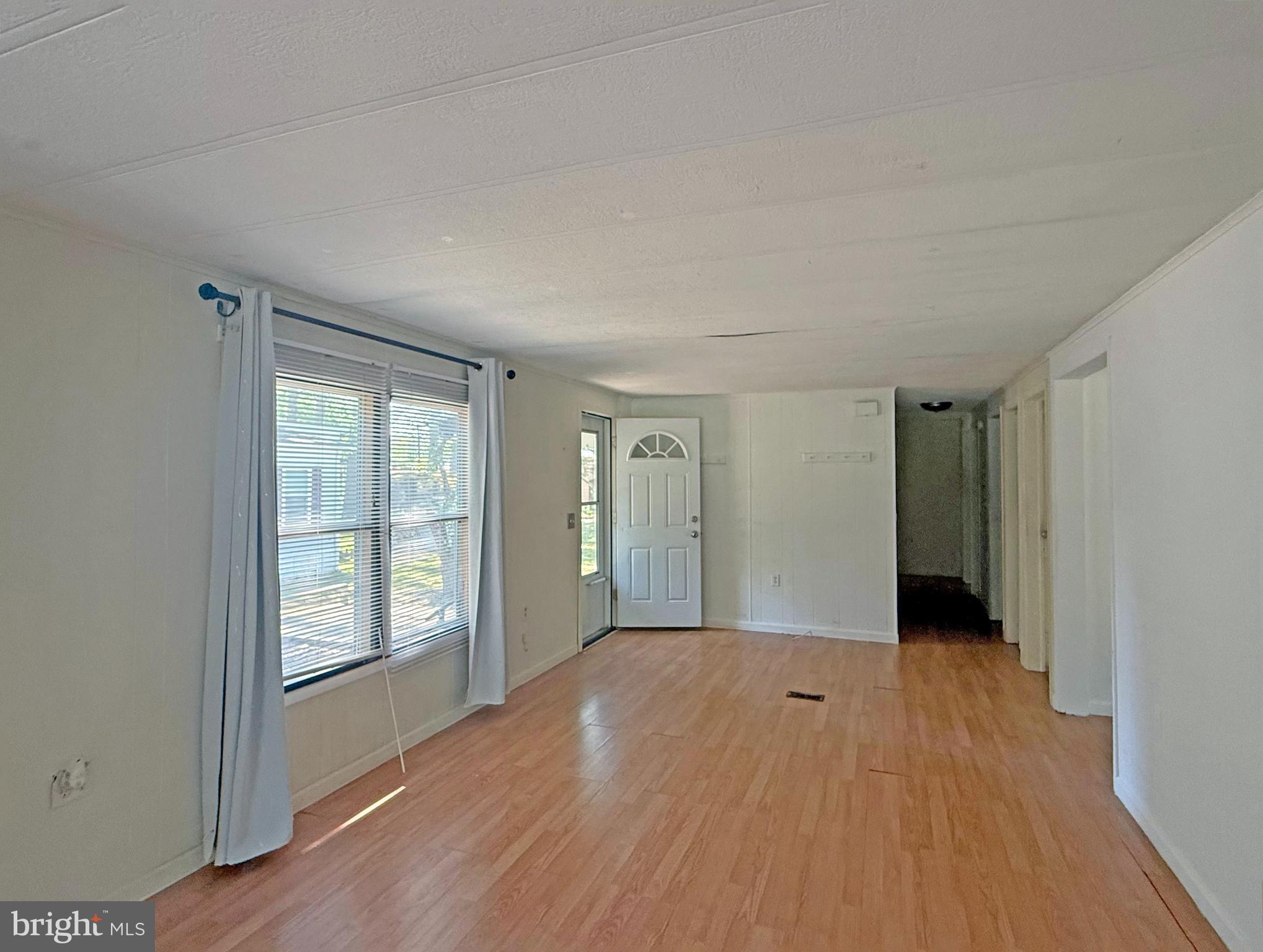 36298 Marsh Road, Unit 204 Rehoboth Beach, DE 19971 - Photo 2 of 26 Living Room