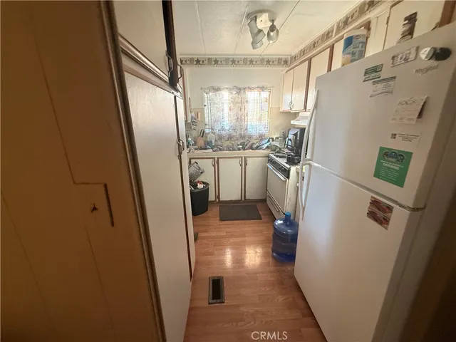 a view of a kitchen with a sink