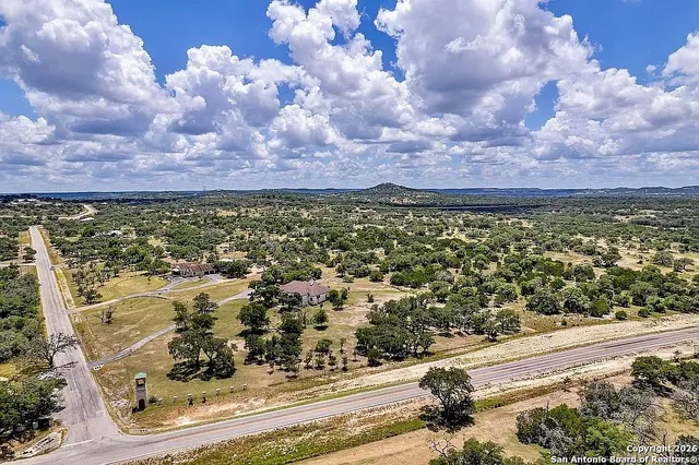 a view of a lake with a building in the background