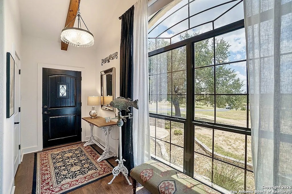 1112 Kendall Jackson Comfort, TX 78013 - Photo 6 of 32 a view of a hallway with living room and dining room view