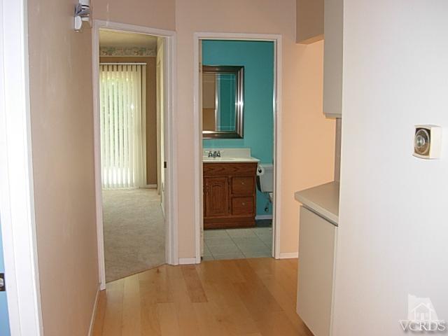 2120 Outsail Lane Oxnard, CA 93035 - Photo 12 of 24 a view of a bathroom from a hallway