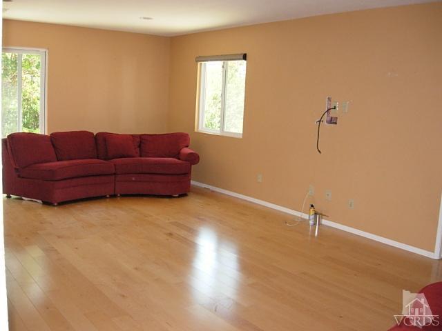 2120 Outsail Lane Oxnard, CA 93035 - Photo 9 of 24 a living room with furniture and a window