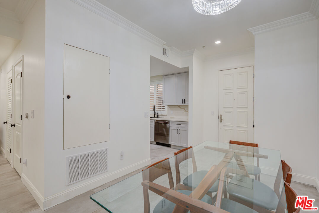 1444 South Point View Street, Unit 103 Los Angeles, CA 90035 - Photo 16 of 44 a view of kitchen with furniture and wooden floor