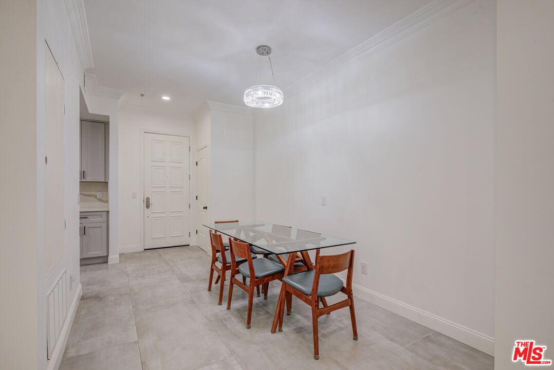 1444 South Point View Street, Unit 103 Los Angeles, CA 90035 - Photo 18 of 44 a view of a room with chairs