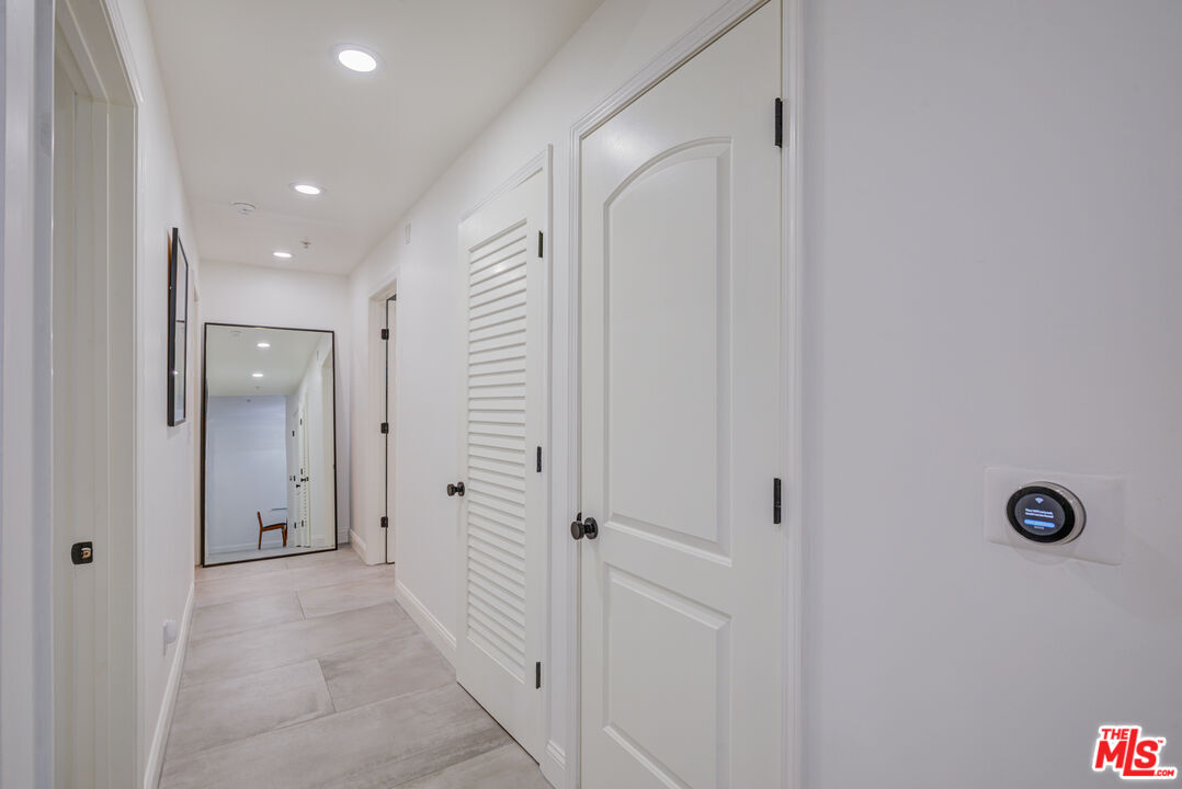 1444 South Point View Street, Unit 103 Los Angeles, CA 90035 - Photo 31 of 44 a view of a hallway