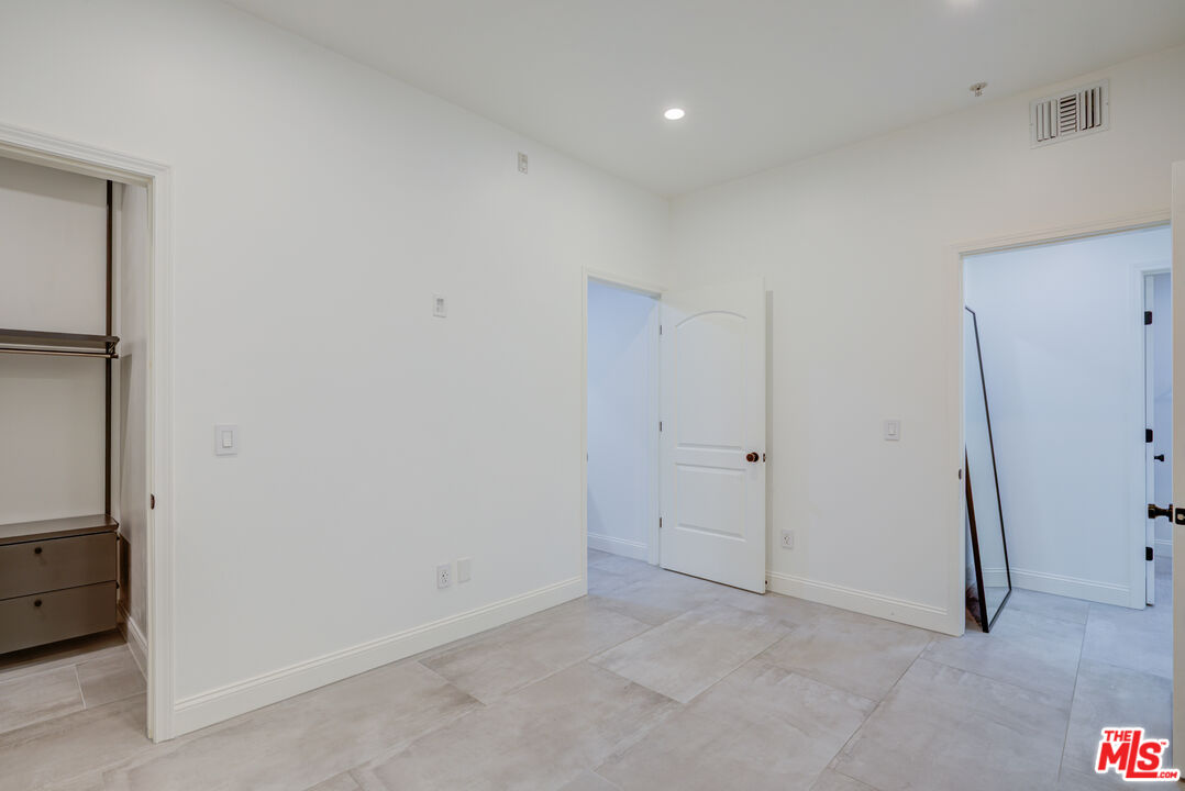 1444 South Point View Street, Unit 103 Los Angeles, CA 90035 - Photo 33 of 44 a view of an empty room