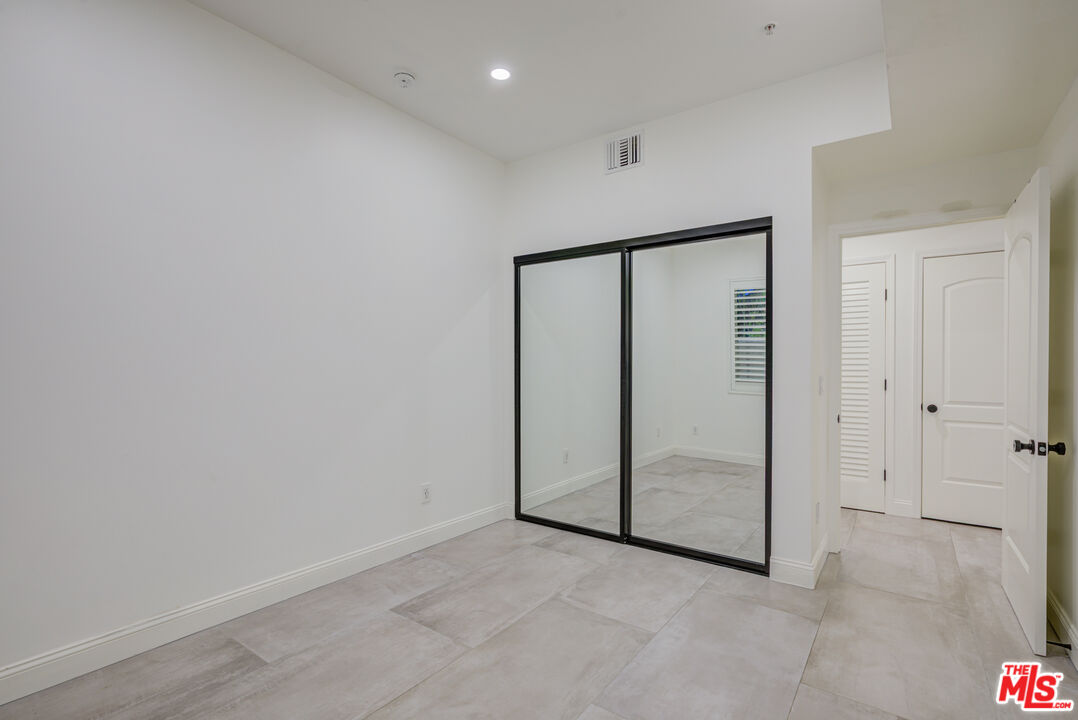 1444 South Point View Street, Unit 103 Los Angeles, CA 90035 - Photo 35 of 44 a view of an empty room