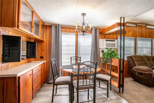 a balcony with furniture and a window