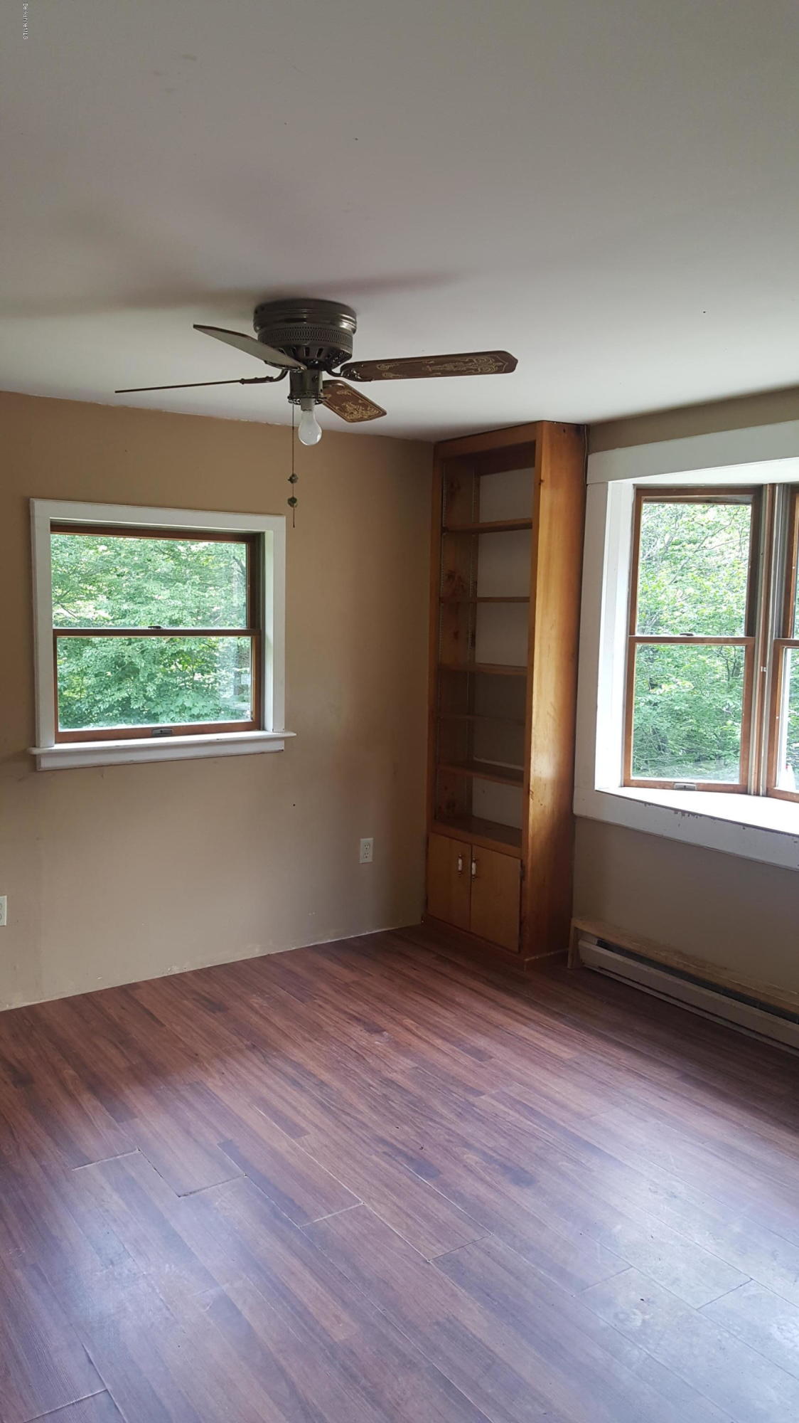 13 Kreutzer Road Peru, MA 01235 - Photo 12 of 21 a view of an empty room with a window and wooden floor