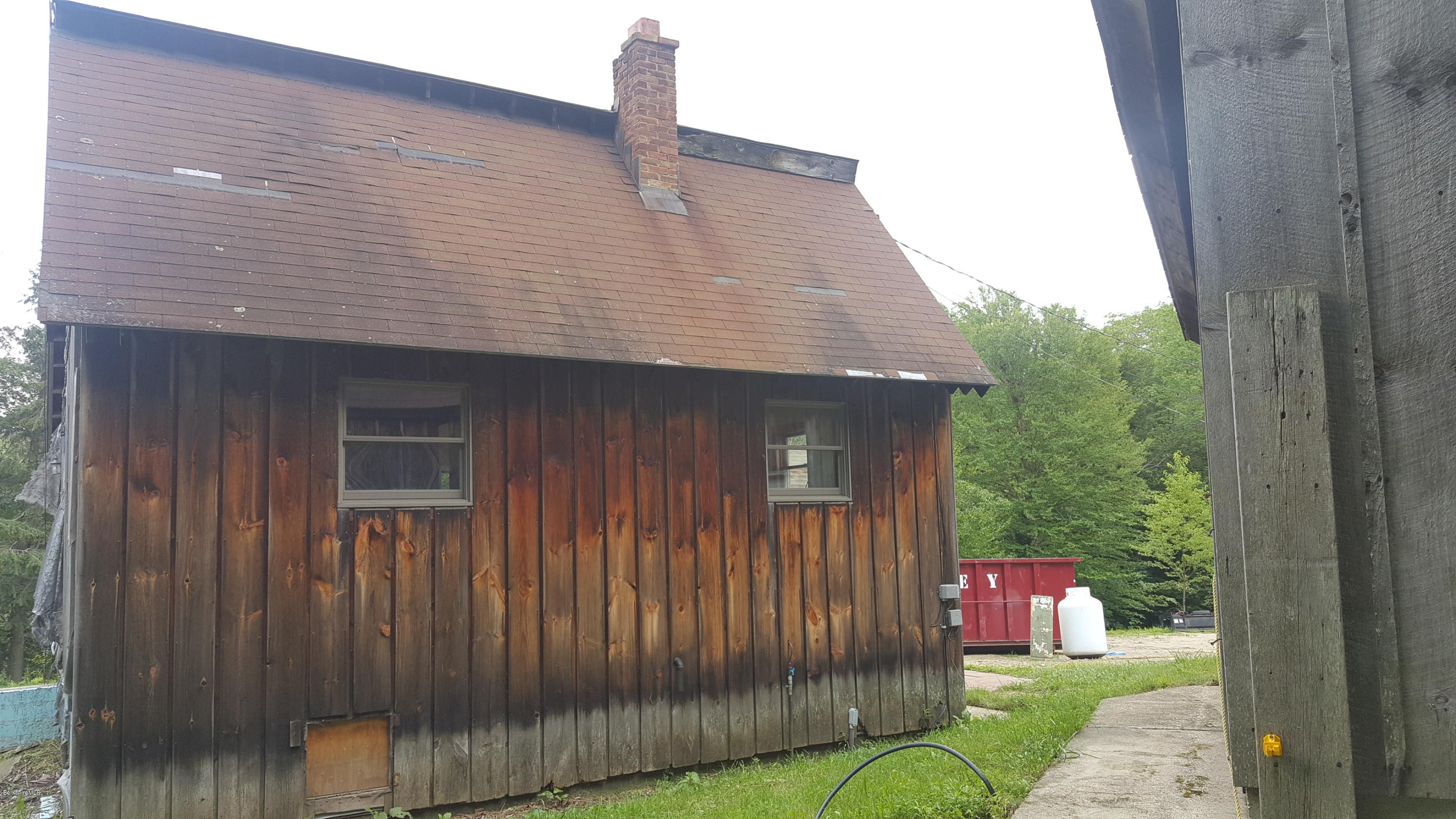 13 Kreutzer Road Peru, MA 01235 - Photo 3 of 21 a front view of a house with a garden