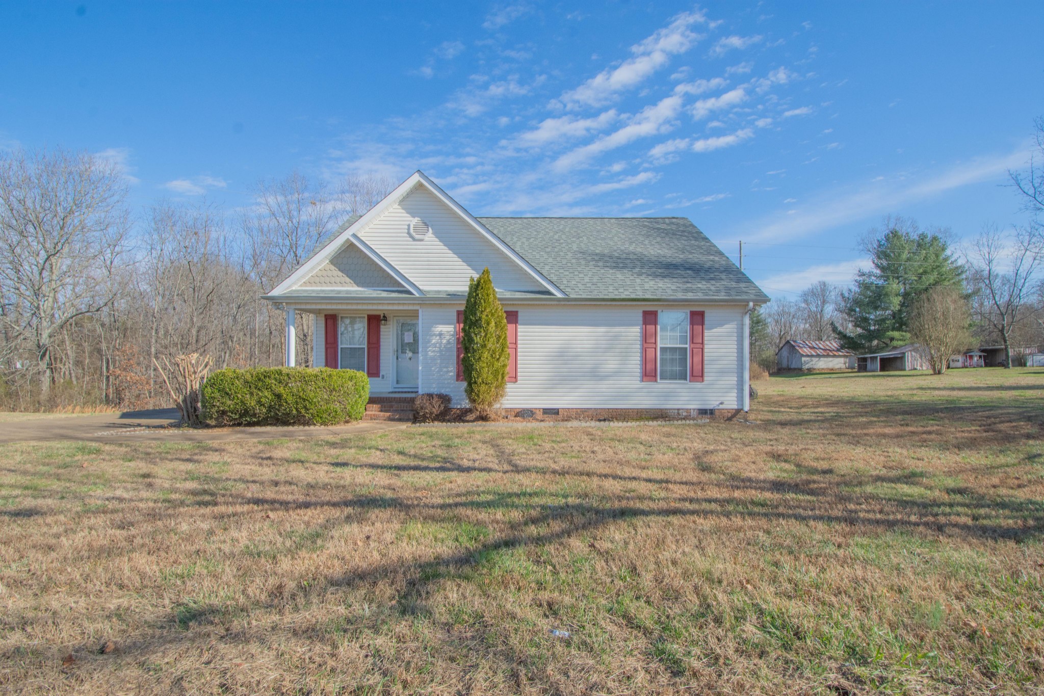 1149 Oak Grove Road Goodspring, TN 38460 - Photo 2 of 21 a front view of a house with a yard