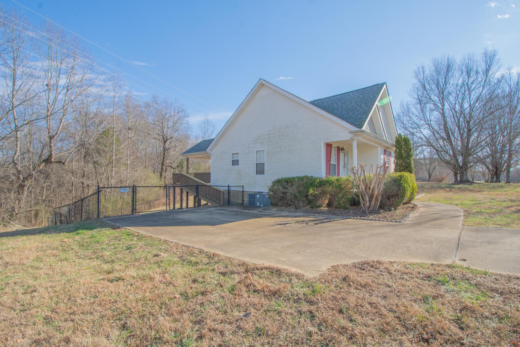 1149 Oak Grove Road Goodspring, TN 38460 - Photo 5 of 21 a front view of house with yard and trees around