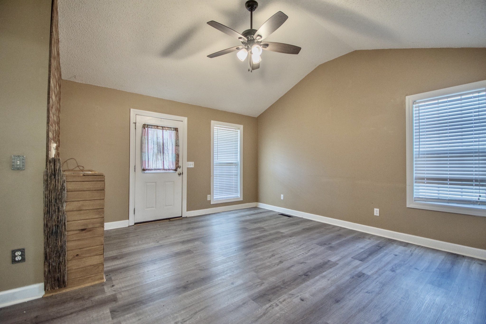 1149 Oak Grove Road Goodspring, TN 38460 - Photo 10 of 21 wooden floor in an empty room with a window