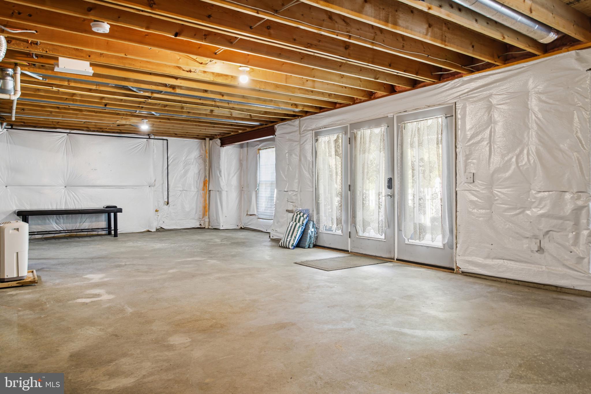 7 Derr Lane Middletown, MD 21769 - Photo 26 of 33 Unfinished Lower Level + Walkout To Patio/Koi Pond