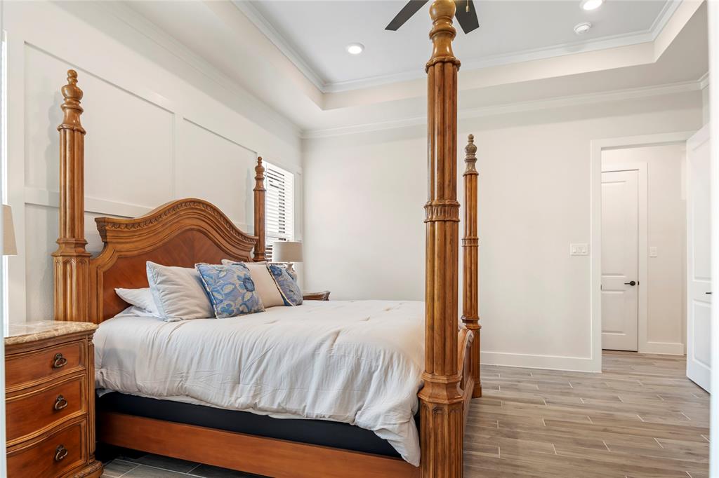 704 Abbey Road Van Alstyne, TX 75495 - Photo 20 of 38 a bedroom with a bed and a dresser