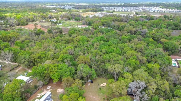a view of a yard with an outdoor space