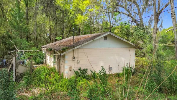 a backyard of a house with lots of green space