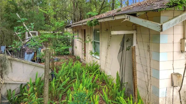 a yellow house with outdoor space