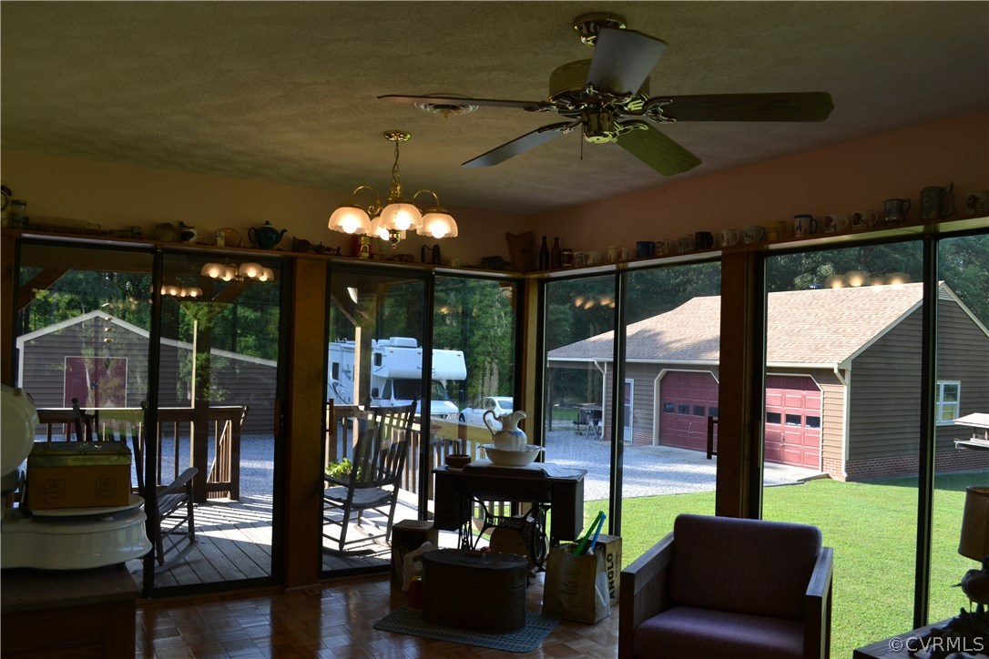 9711 Beaver Bridge Road Chesterfield, VA 23838 - Photo 17 of 24 a dining room with furniture and a floor to ceiling window