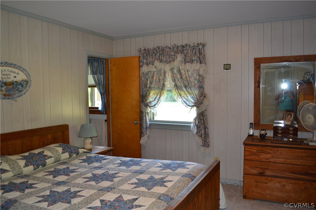 9711 Beaver Bridge Road Chesterfield, VA 23838 - Photo 23 of 24 a bedroom with a bed and a dresser