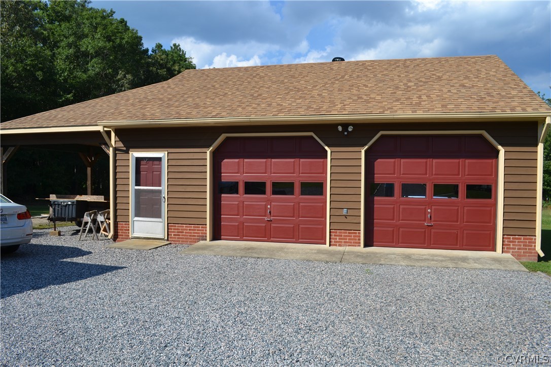 9711 Beaver Bridge Road Chesterfield, VA 23838 - Photo 5 of 24 a front view of a house with glass windows