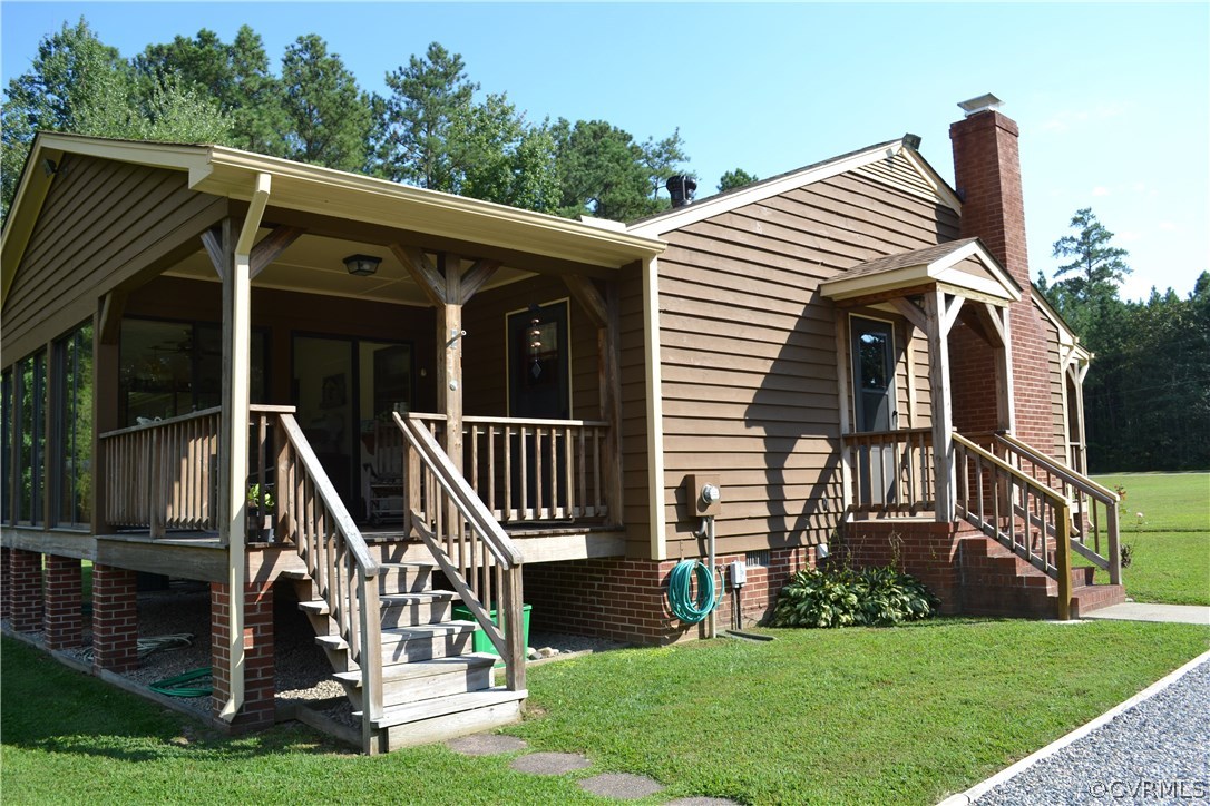9711 Beaver Bridge Road Chesterfield, VA 23838 - Photo 8 of 24 a front view of a house with a yard