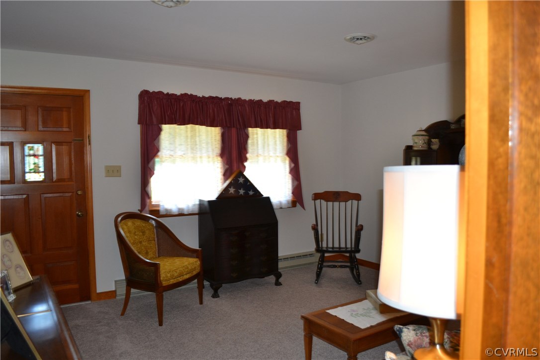 9711 Beaver Bridge Road Chesterfield, VA 23838 - Photo 9 of 24 a living room with furniture and a window