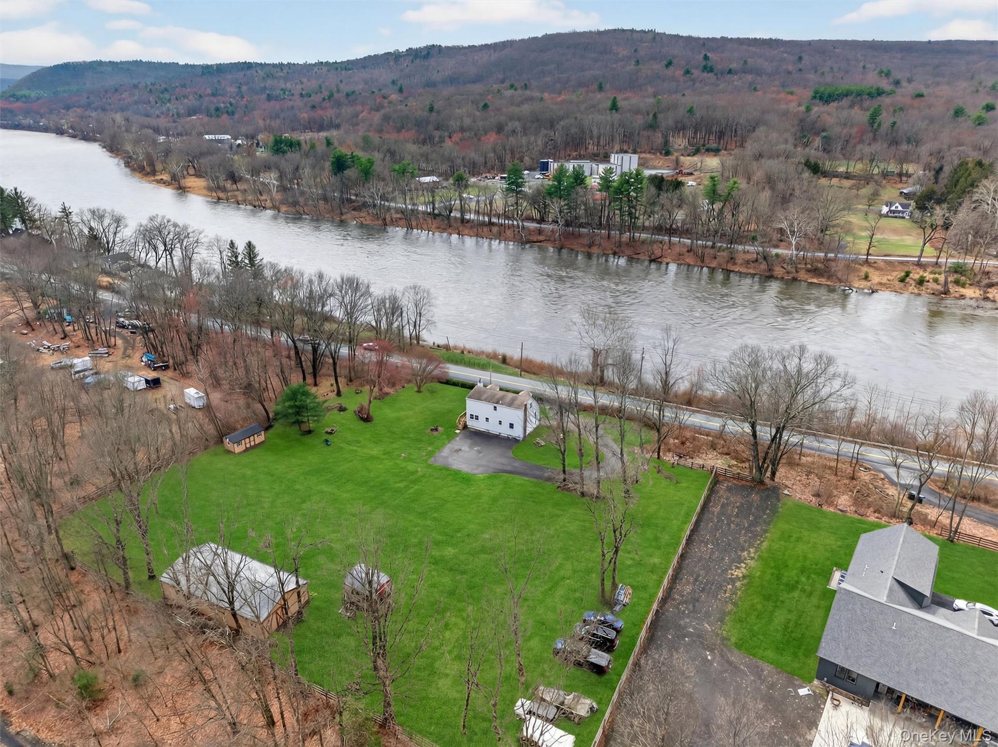 Beautiful river view featuring the home and yard that overlooks the Delaware River