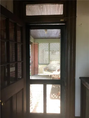 a view of a bench in front of house