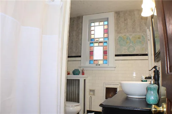 a living room with furniture and a window