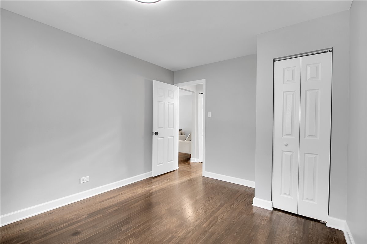 11524 South Kildare Avenue Alsip, IL 60803 - Photo 12 of 34 a view of an empty room and wooden floor