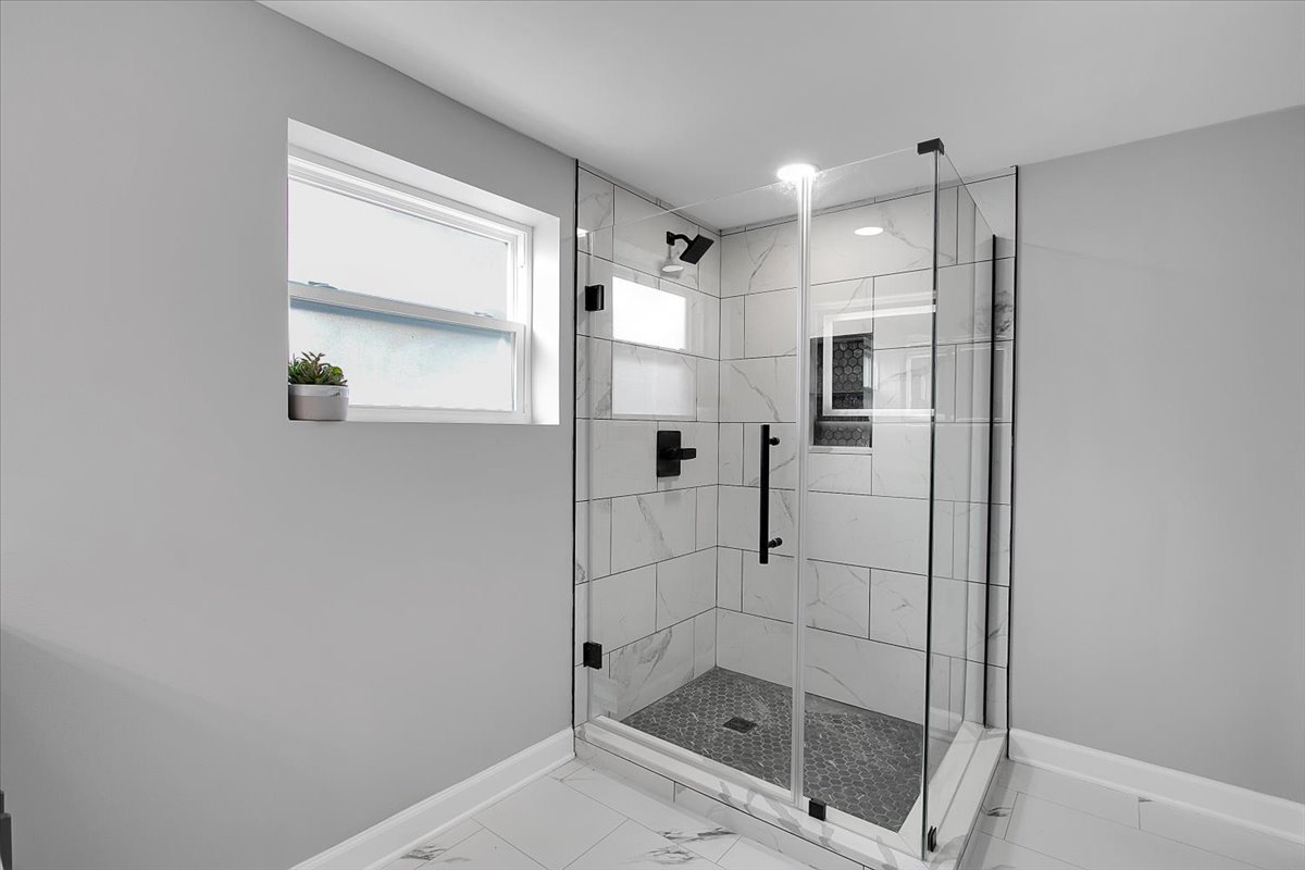 11524 South Kildare Avenue Alsip, IL 60803 - Photo 26 of 34 a bathroom with a shower and a sink