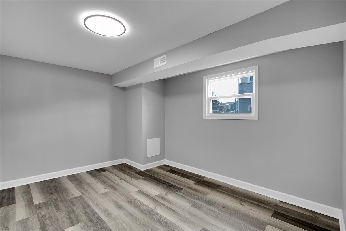 11524 South Kildare Avenue Alsip, IL 60803 - Photo 28 of 34 a view of a room with wooden floor and window