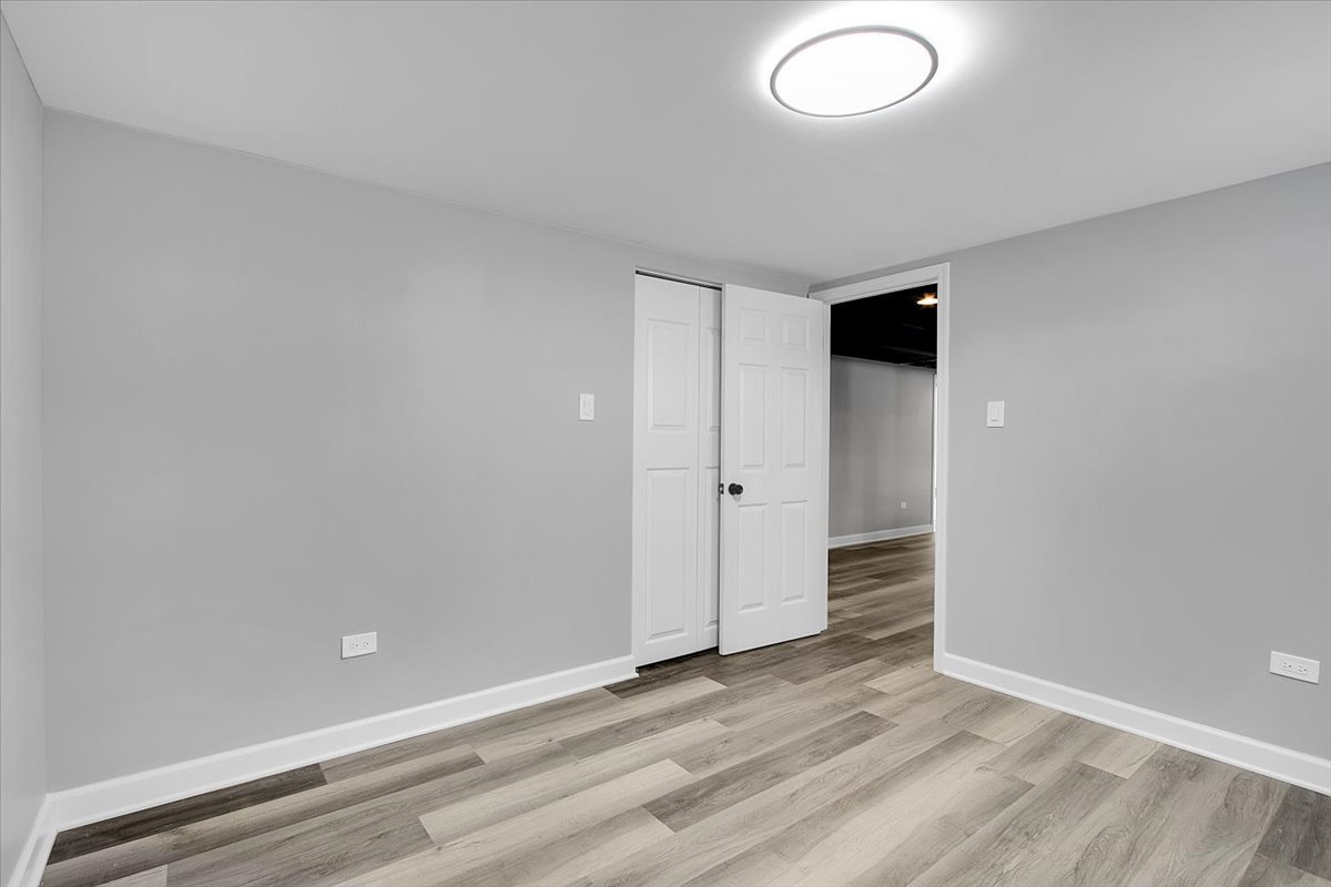11524 South Kildare Avenue Alsip, IL 60803 - Photo 31 of 34 wooden floor in an empty room