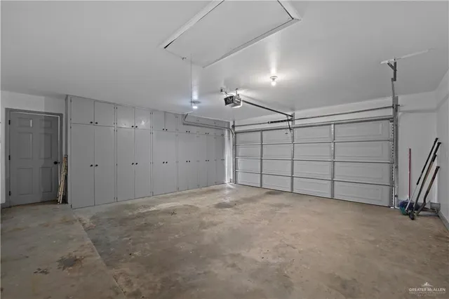 a view of an empty room with a windows