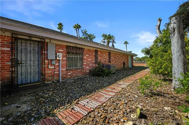 a view of a porch with wooden floor and roof